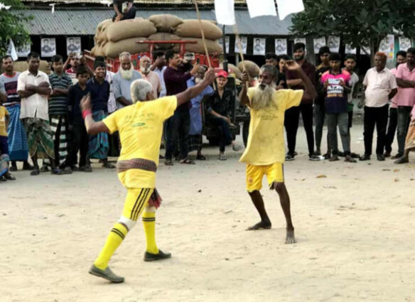 আত্রাইয়ে বিলুপ্ত প্রায় গ্রাম-বাংলার ঐতিহ্যবাহী লাঠি খেলা।
